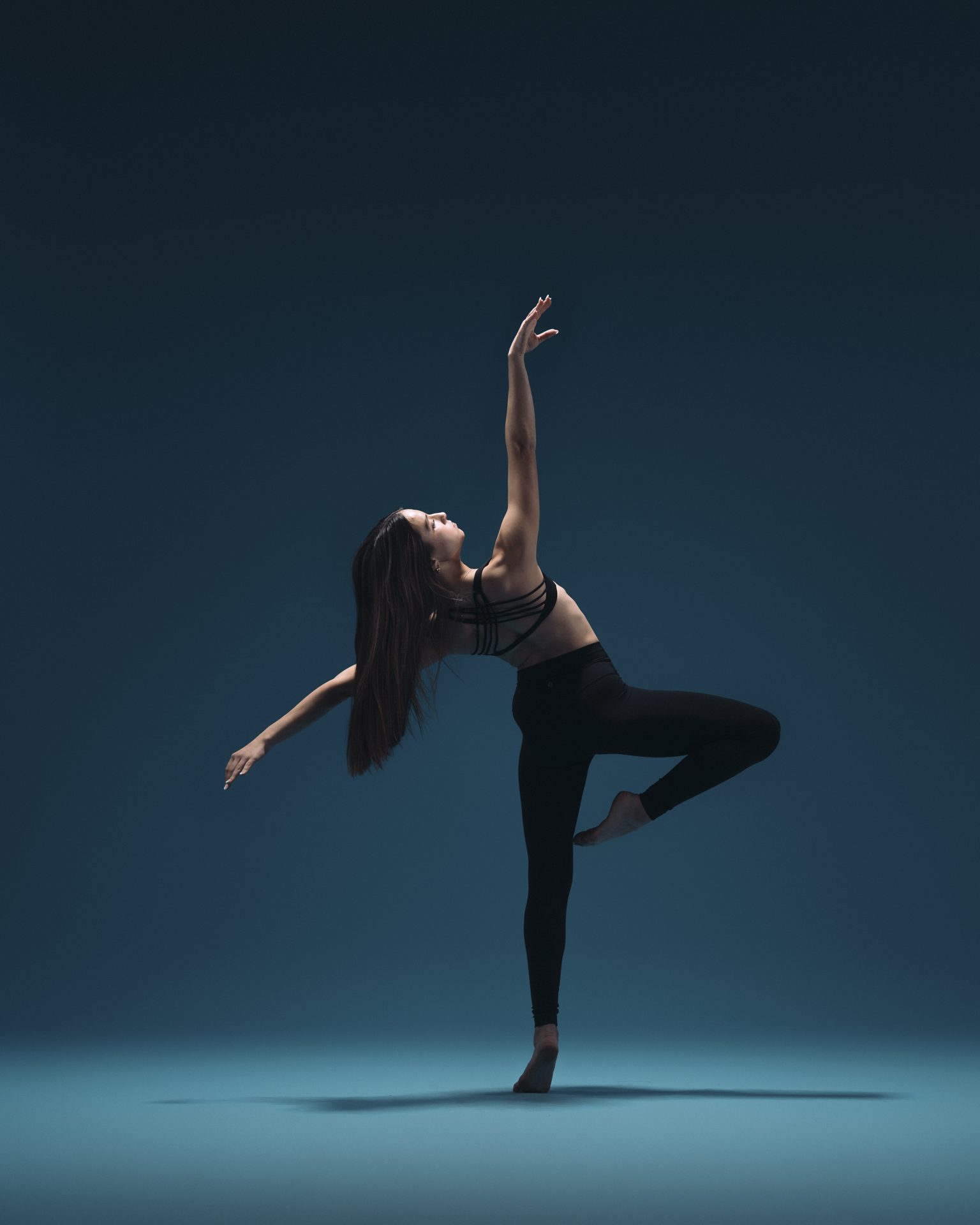 Dancer in a turned attitude pose