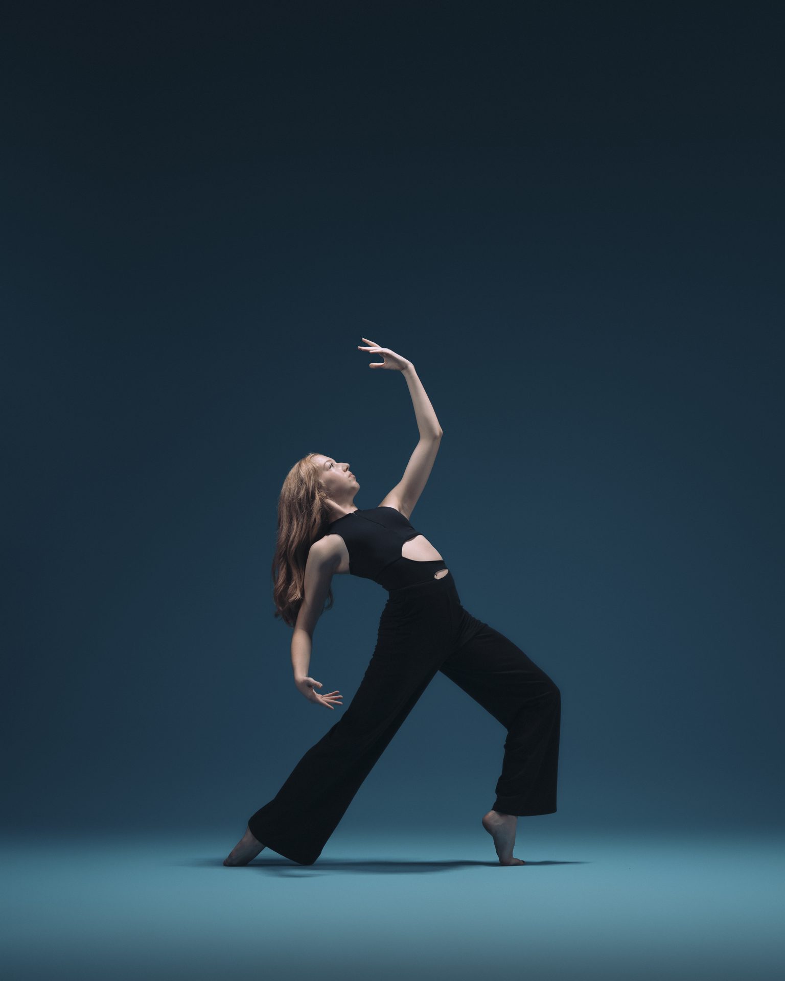 Instructor demonstrating an elegant reach